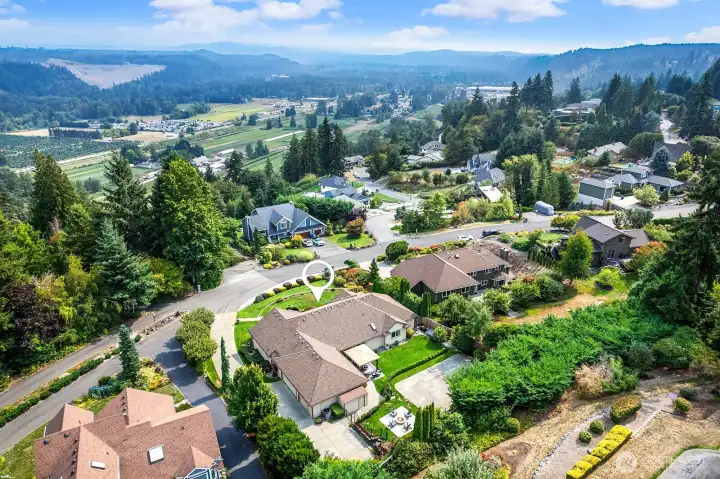 Aerial views of the home and surrounding area. Close to amenities, shopping, restaurants, schools and more!