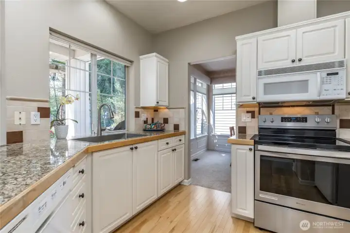 Hardwood flooring and tiled backsplash