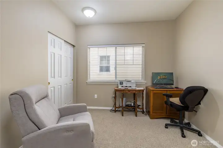 Main floor bedroom (or office) is right next to a full bathroom