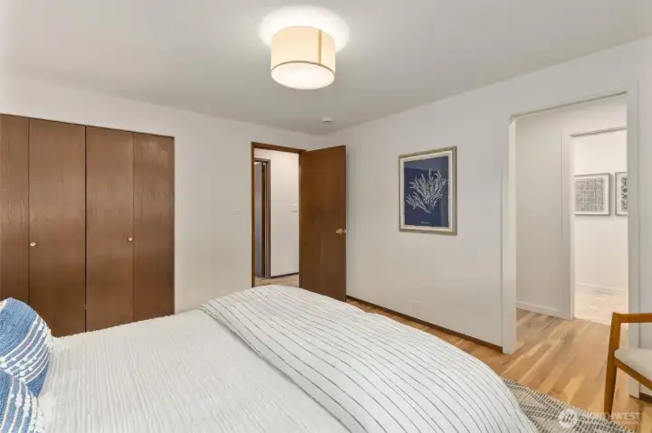 Primary has 2 closets. One on the left and a walk in closet to the right