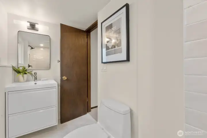 3rd bathroom on lower level has a new tiled shower