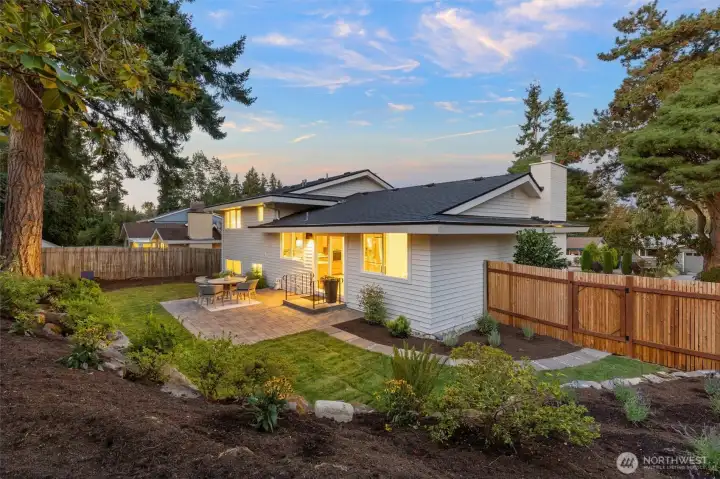 Beautiful landscaped yard with new and mature plantings.