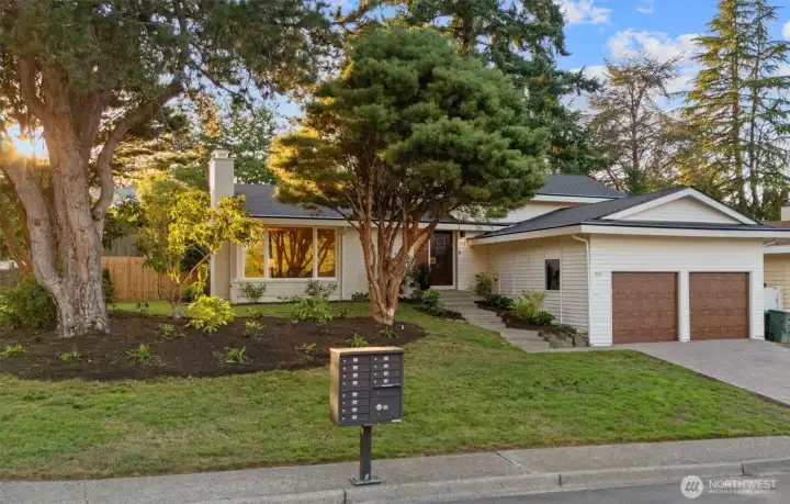 Beautiful landscaped yard with new and mature plantings.