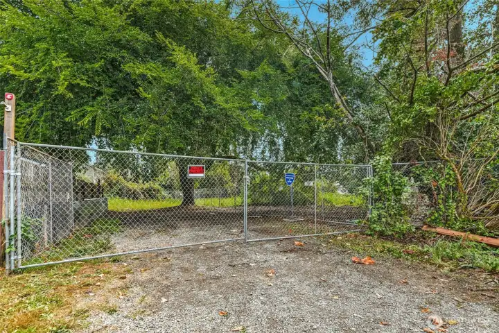 Driveway easement across multifamily parcel to south.