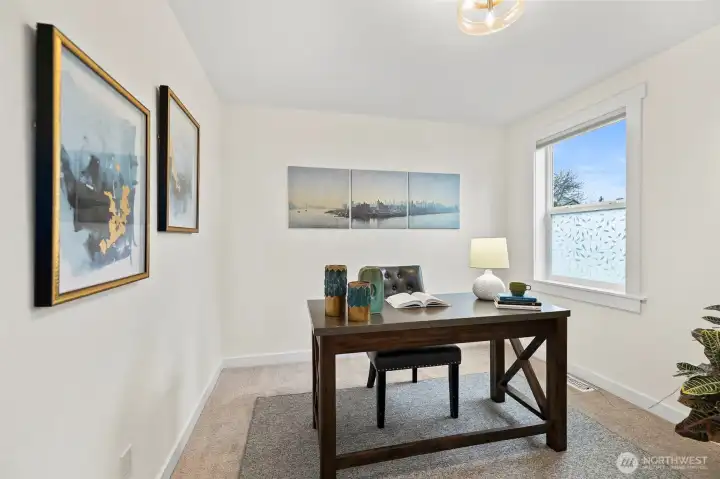 A guest bedroom; shown here as a den/office