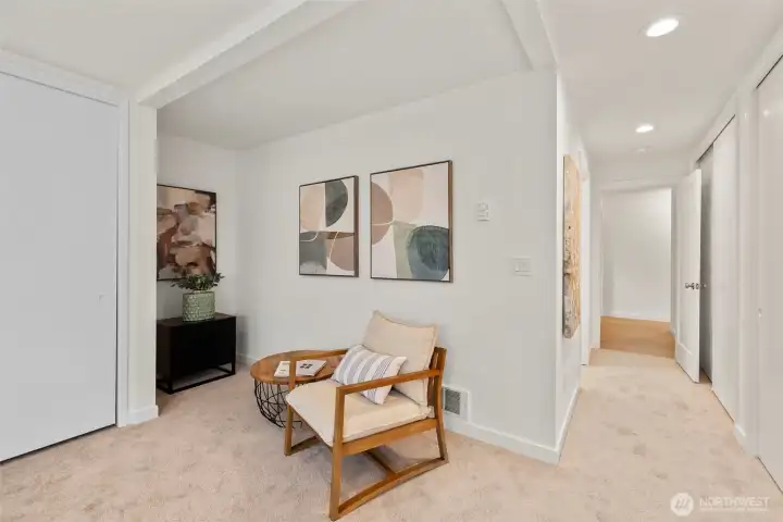 The entrance to the  spacious Primary bedroom. All new carpeting!