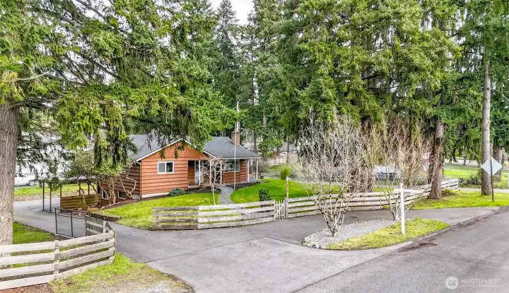 Welcome home! Fully fenced .38 Acre lot gives you room to live and space to grow!