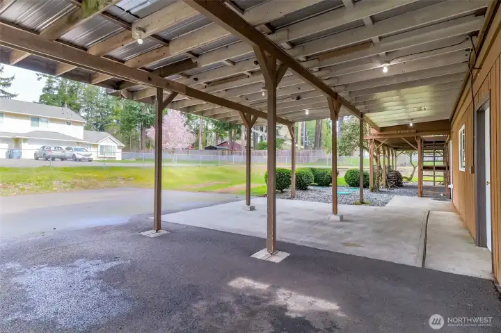Covered parking for 3 cars... potentially 4 or recreational vehicle as one spot is extended longer.