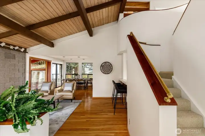 Entry opens to living room and stairway to second level