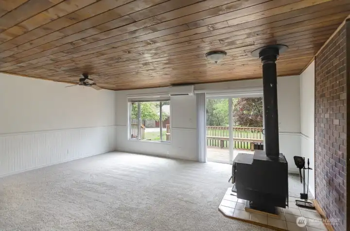 Freshly painted interior, complete with wainscotting detail, updated windows and energy efficient ductless mini split, which provides year around comfort. Wood stove as additonal heat source, plus brand new built-in generator system so you are never without power.