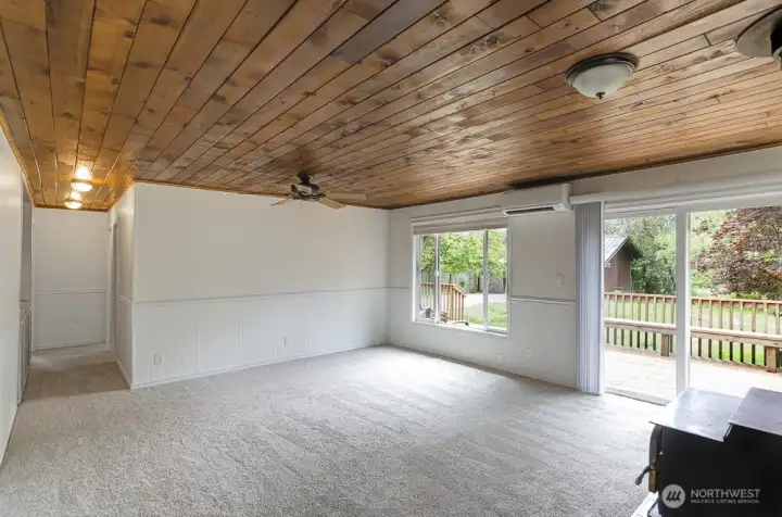 Another view showing hallway to bedrooms and bath.  These large windows offer lots of natural light.  Brand new carpet throughout.