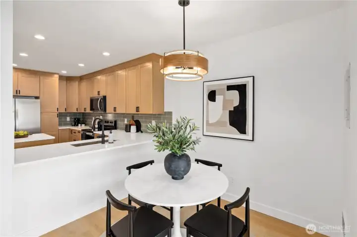 Dining area and kitchen Dining area and kitchen