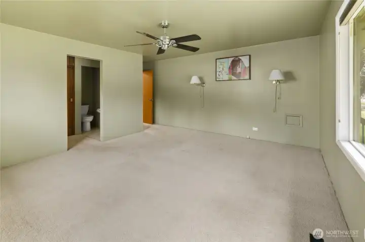 Generous bedroom space designed for comfort and relaxation.