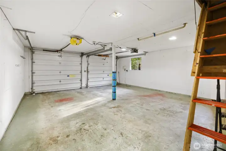 Attached two-car garage provides convenient parking and storage.
