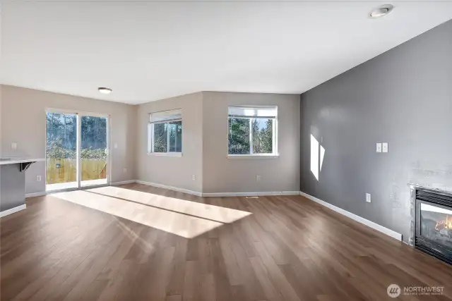 Living and Dining Room looking out to the back yard view.