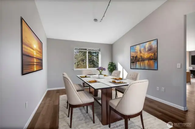 Dining Room adjacent to the kitchen. (virtually staged)