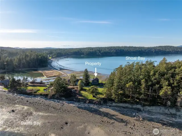 Property seen from the Swifts Bay side of the spit. Road passes through the middle of the spit and the parcel is located on the far side.