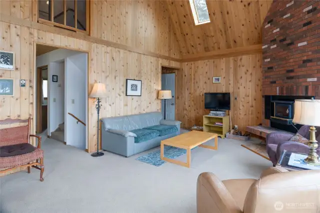 Great room looking toward stairwells and upper level
