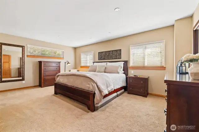 This luxurious primary en suite combines elegance with convenience.