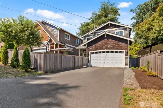 This home features a two-car garage with an EV charger and ample extra storage space.