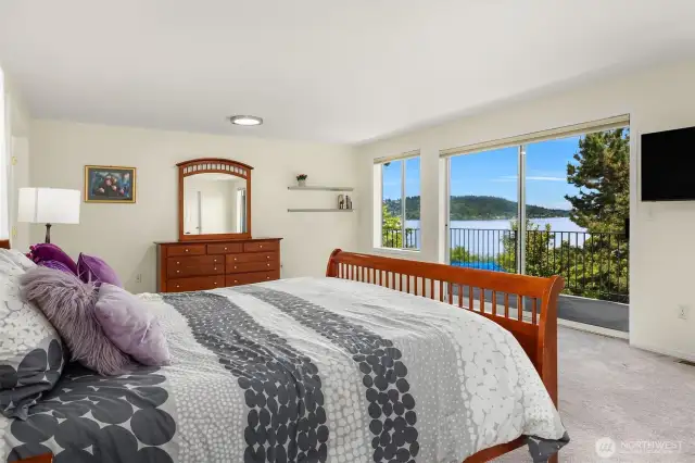 Primary bedroom with slider to deck