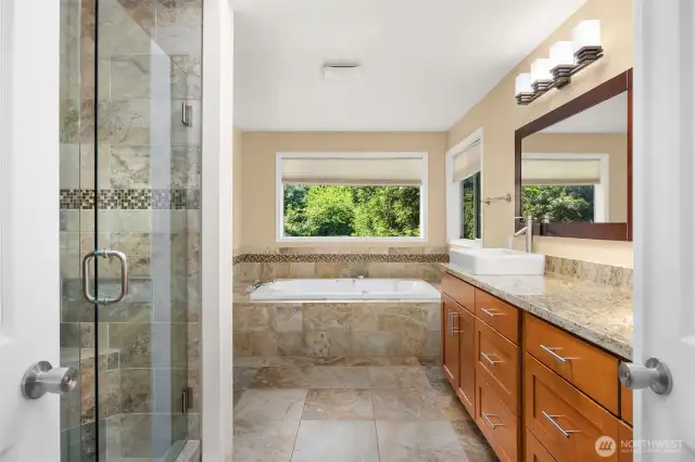 Beautiful tile throughout the primary bathroom.