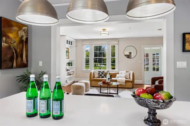 From kitchen to hearth, the home unfolds in effortless dialogue—spaces connected not only by thoughtful design, but by a shared spirit of welcome. Here, modern fixtures meet timeless form, offering a backdrop for both lively gatherings and solitary mornings steeped in quiet.
