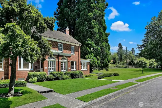 Framed by storybook lawns and sentinel trees, 4404 Montana Circle evokes an era of quiet dignity and enduring craft. Nestled on a landmarked street once home to Army officers, this residence is now a private haven—where children bike freely, neighbors linger in conversation, and life gently unfolds inside Seattle’s largest park.
