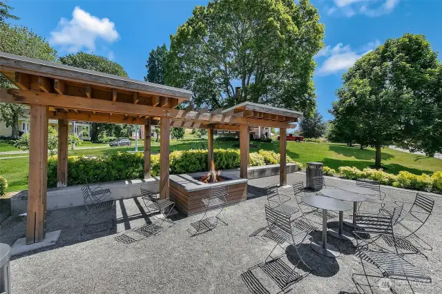 At the heart of the neighborhood, this thoughtfully designed firepit pavilion brings neighbors together under open skies. Roast marshmallows, share stories, or simply warm your hands as the embers glow—surrounded by lush lawns, historic homes, and the enduring spirit of Discovery Park.