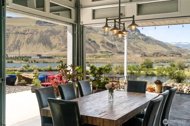 Dining Room With Open Garage Doors