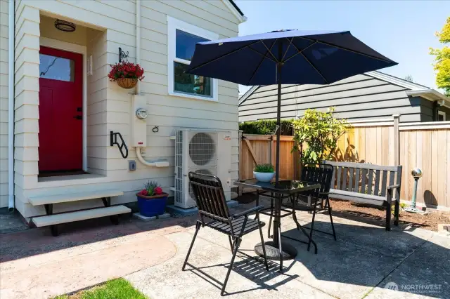Private patio off back entry, a place for relaxing on sunny, summer days