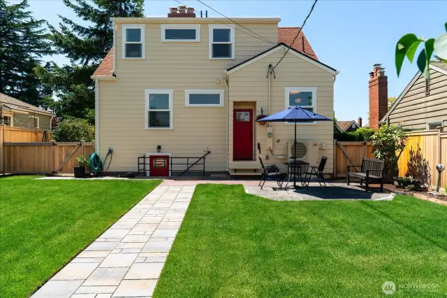 Plenty of space for outdoor enjoyment in this newly sodded and fully fenced yard with three gates offering access to all areas of beautifully landscaped flower beds with mature trees and bushes.