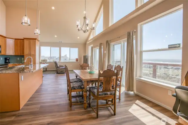 Moving out of the kitchen, you enter the living room, and around the corner is the primary suite.