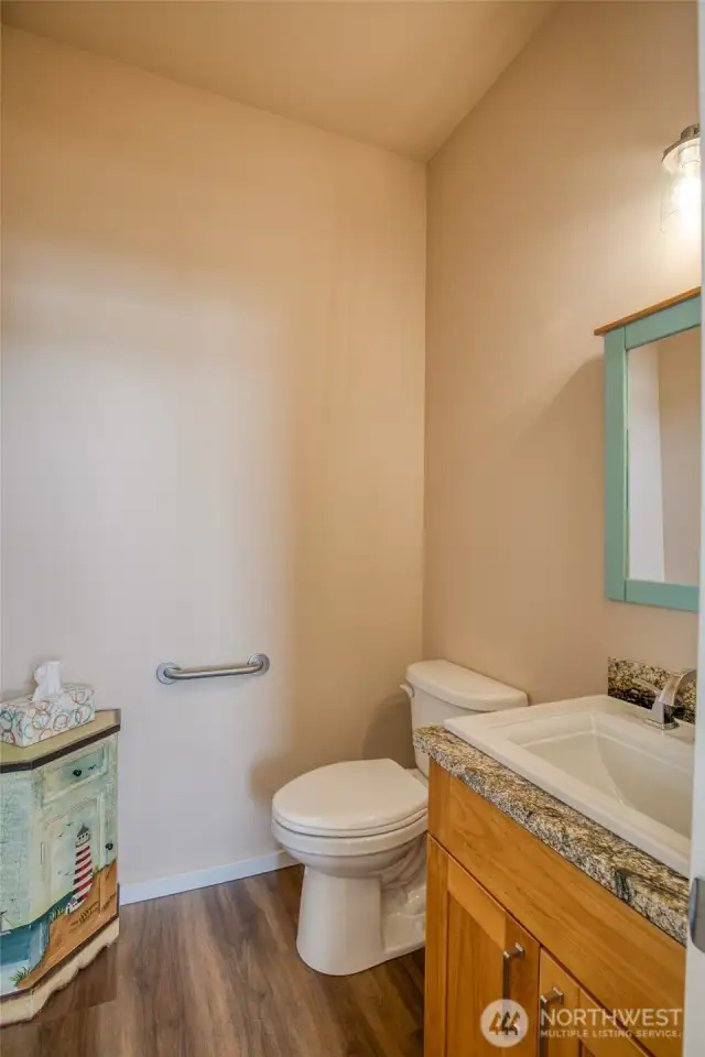 There is also a half bath upstairs.