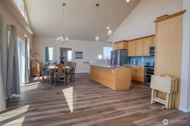 Upstairs you will find open concept living/kitchen/dining areas, with a half bath and the primary suite.