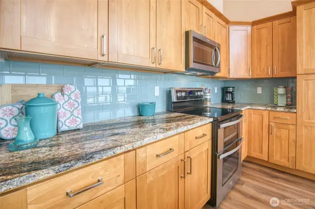 Clean and simple, the kitchen is beautiful.