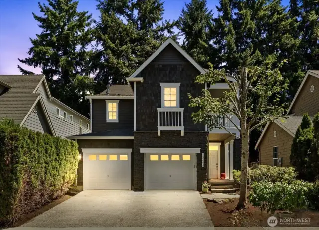 Front exterior photo, 2-car garage with EV charging, freshly painted