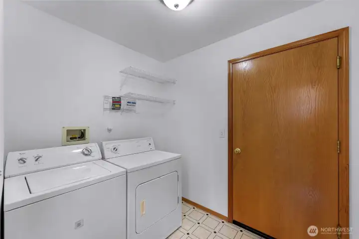 Utility Room with Washer and Dryer that stay with the home