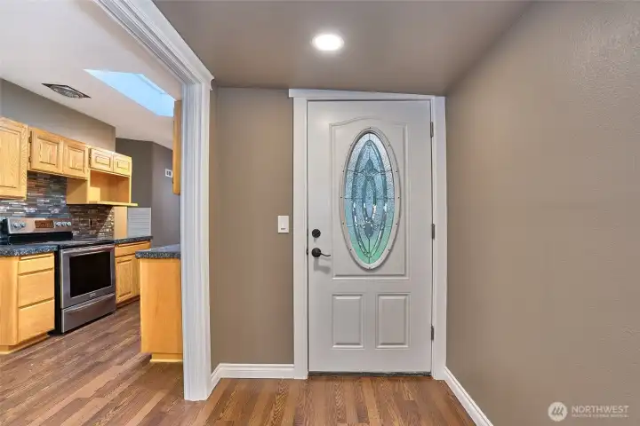 Back door to large backyard. Kitchen.