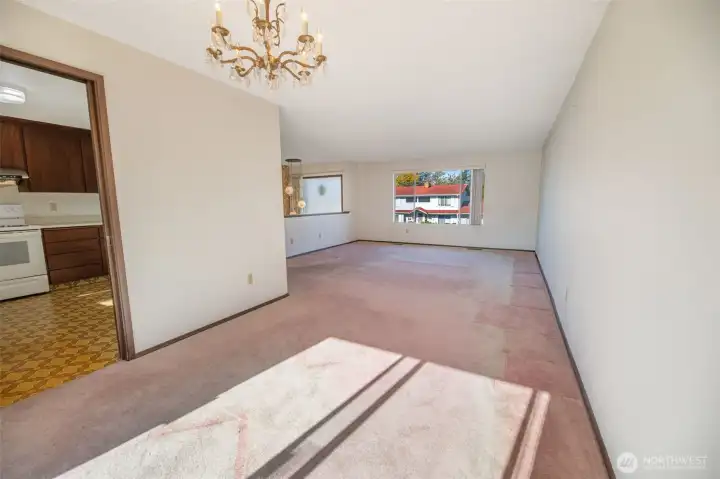 The kitchen wall could be opened and an island could be added.