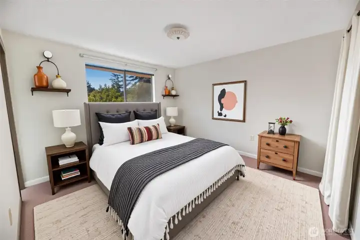 Bed 1/5 - spacious primary bedroom has plenty or room for a king size bed. (Virtually staged)