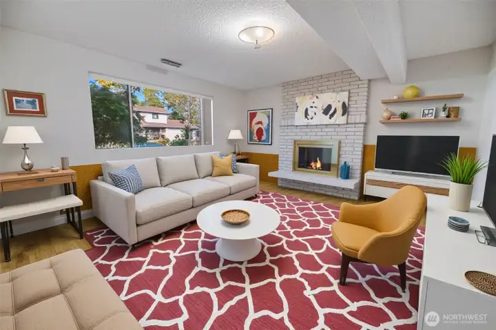 Virtually staged family room in daylight basement.
