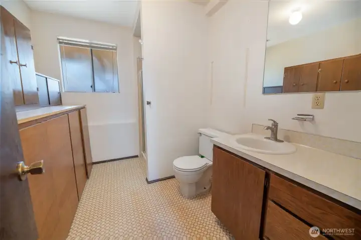 Main level has a very large 3/4 bath with additional built-in storage