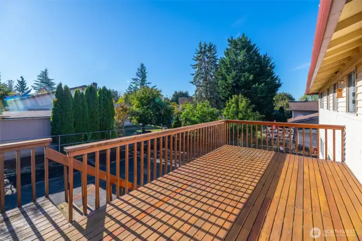 This large deck is located off the dining room on the upper level of this home.