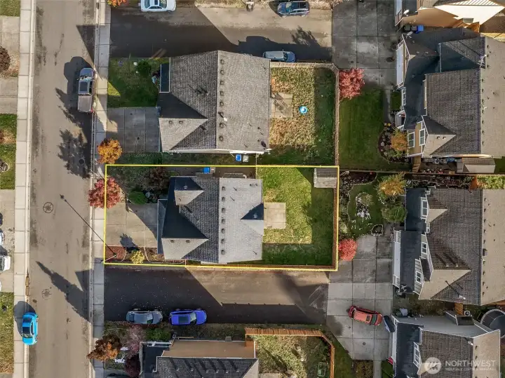 Home is nestled on a corner lot.