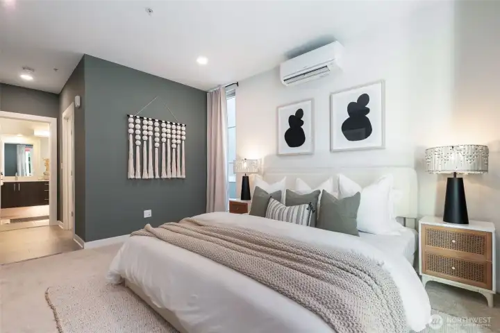 A refreshed primary suite with soothing sage tones designed for slow mornings and easy nights.