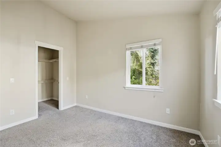 bedroom angle view into walk in closet