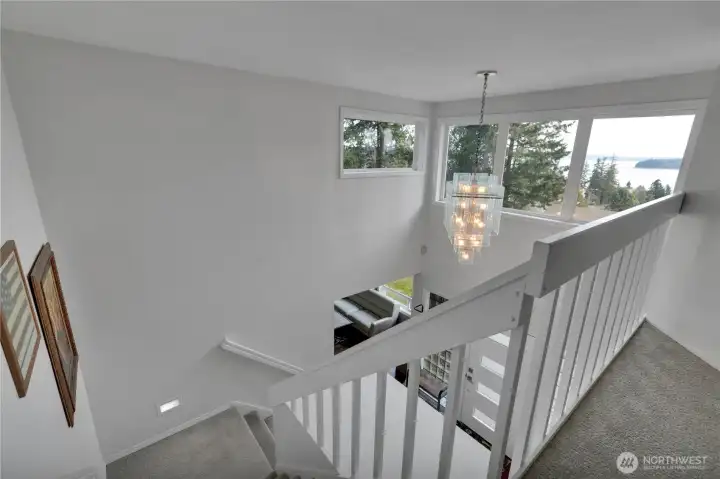 Upper landing is accented with a sneak peek View of Puget Sound