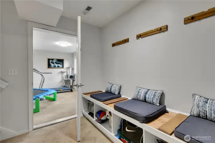 Entry from garage offers a convenient stop to unload shoes, books and jackets etc