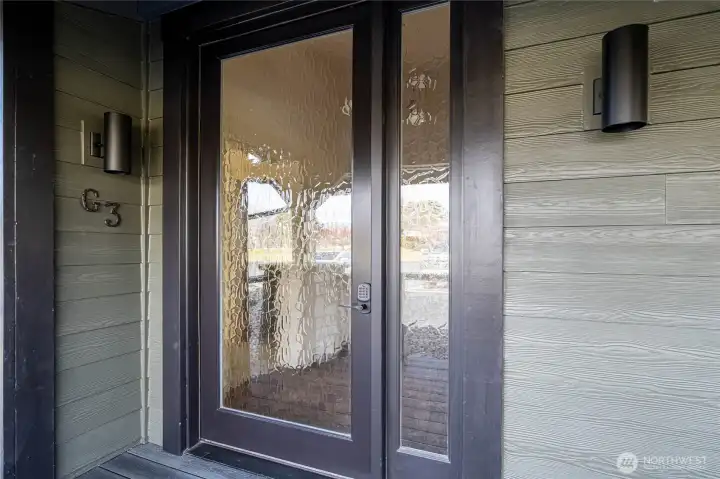 Frosted clearlight glass front door for privacy and light.